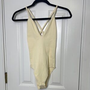Cream Bodysuit with Plunging V-Neck and Textured Fabric NWOT